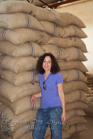 Ellen in front of Stacks & Stacks of Coffee Beans.......Gimutindo Coffee Processing FacilityMbale, Uganda